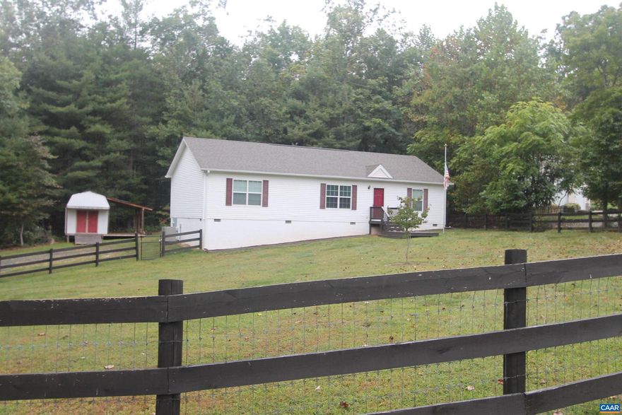 Twin Lakes ? Move-In Ready! One-level living on 0.7 acres! Open floor plan with spacious kitchen, bright living room & dining area that opens to the Deck. Primary suite with walk-in closet, dual vanities & walk-in shower. Two additional bedrooms with walk-in closets & full bath. Separate mudroom, laundry & utility room. Hardwood floors in the main living areas. Private wooded backyard with deck & storage shed with covered decking. Fully fenced in Front Yard.  New Washer, Dryer, & Hot Water Heater.  HVAC has recently been serviced.,Wood Cabinets