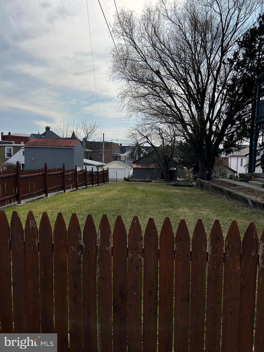 A rare find - check out this buildable lot in Kutztown borough.   The current owner has gotten zoning approval to convert the existing 17x32 garage into a single family residence by building additional stories on the garage  structure.  Please see attachments for zoning approval details including parking space requirements on the lot. Please ask your agent to provide you with proposed home plans that are attached to listing.