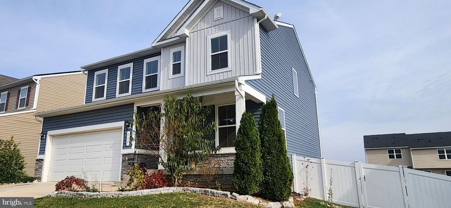 Welcome to 409 Warrenfeltz Place in the desirable Cedar Spring Estates community of Strasburg! This beautiful newer home, built in 2020, has been lovingly maintained and offers the perfect blend of modern comfort and small-town charm.
Step inside to a spacious parlor or additional living area—a versatile space to greet guests or relax. Continue further into the heart of the home, where the open-concept kitchen and living room create a bright, welcoming atmosphere. With 9+ foot ceilings, large windows, and a sliding glass door, natural light fills the space. The kitchen features a large granite island, abundant cabinetry, and an oversized pantry, making it a dream for everyday living and entertaining.
Upstairs, you’ll find three bedrooms, including a primary suite with its own en-suite bath. Two additional bedrooms share a full hall bath, offering plenty of room. A conveniently placed laundry room and loft/office area. If that isn’t enough space for you there is a half bath on the main level for guest and a half bath in the partially finished walk-out level basement. This home is equipped with a Radon Mitigation system giving you peace of mind. 
Outside, enjoy a peaceful neighborhood setting in one of Strasburg’s newer, sought-after subdivisions. With its thoughtful layout, modern finishes, beautiful views and welcoming feel, this home is ready for you to move in and make it your own!