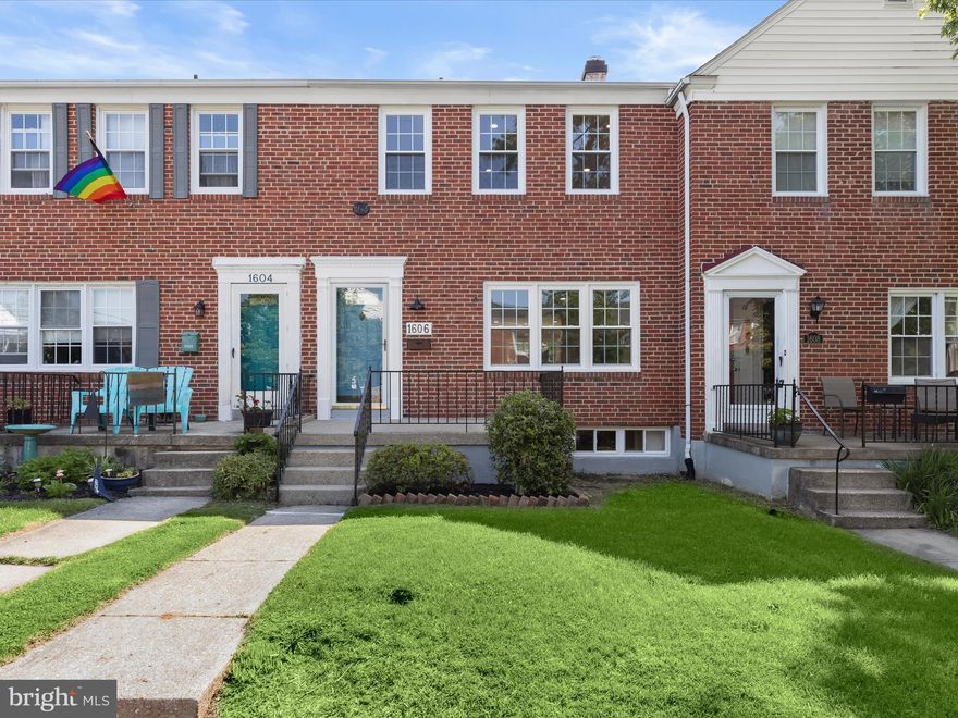 Welcome to this fully renovated four bedroom, two bathroom townhome in the charming Loch Raven Village. Step inside to find beautiful hardwood floors, elegant crown molding, updated recessed lighting, and a freshly painted neutral palette throughout. Relax in the front living room or gather in the dining area for shared meals. The brand new kitchen features quartz countertops, a tile backsplash, stainless steel appliances, and an island with seating, with a door that leads to a covered back deck that perfect for outdoor dining or lounging. Upstairs includes three bedrooms and a renovated bathroom with a tiled tub-shower. The fully finished lower level provides a cozy recreation room with a wood-burning fireplace, a second full bathroom with a walk-in shower, and a fourth bedroom. The backyard offers additional space for entertaining or play.  Conveniently located just minutes from multiple shopping centers, with everything you need close by.