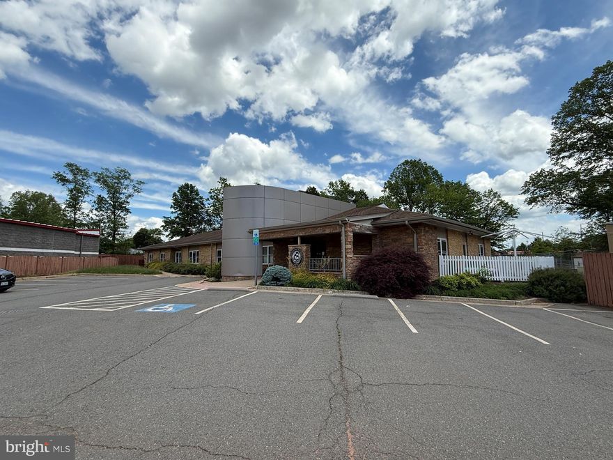 Daycare/Office for lease in the City of Manassas. 6,300 SF building includes two open areas/activity rooms, five classrooms/offices, six bathrooms, kitchen, and storage area.  Sits on 1.11 acres currently set up with fenced in playground.  Playground includes soft mulch, blacktop, and soft rubber ground tiles.  Building is visible from Rt-28 and has easy access to Prince William Parkway.  Plenty of restaurant and shopping options nearby. Zoned I-1.  Tax Map#: 101/51 00/2//.