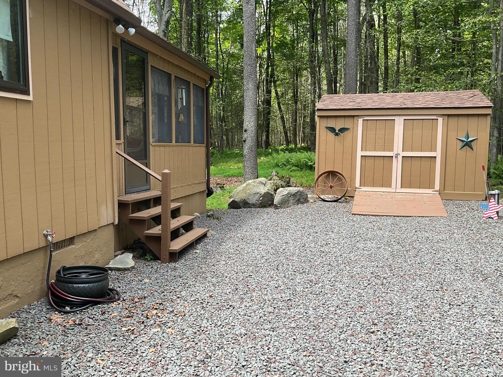 Photo of 301 Maxatawny Drive, POCONO LAKE, PA 18347 (MLS # PAMR2005342)