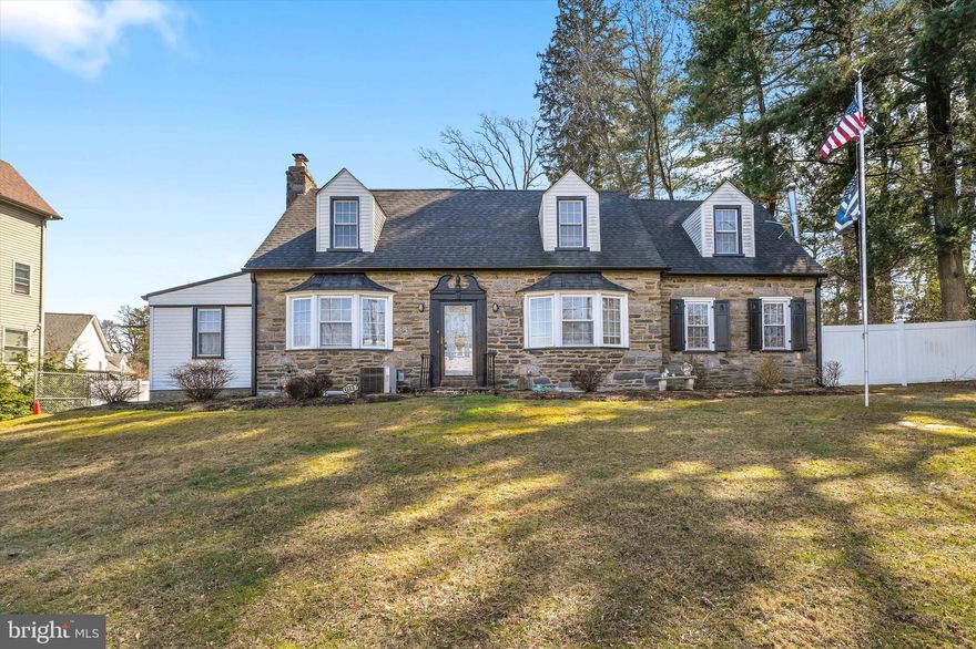 Striking, stone-front Cape ideally situated near the boarder of Philly and Bucks counties featuring a new roof, new siding and an upgraded driveway.  Spacious eat-in kitchen with granite countertops and plenty of cabinets for storage.  Adjacent to the kitchen is a large, formal dining room with a beautiful bay window allowing for a light-filled, airy feel.  The main level also includes 2 spacious living areas, one with an integrated, built-in TV & fireplace wall and the other with a stunning, antique wood-fuel stove.  Lots of room for family living, lounging and entertaining.  A bonus room with French doors currently used as an office, a backdoor mudroom and a newly added powder room complete the main level.  Upstairs boasts hardwood flooring, 3 large bedrooms and 2 recently renovated full bathrooms complete with tiled showers and tile flooring.  Out back stands an over-sized, detached, insulated garage complete with electricity, new roof and new siding.  This space offers endless possibilities such as additional living space, storage, room for the car enthusiast or perhaps an in-law suite.  A new privacy fence surrounding the property compliments this desirable home.  Wonderful opportunity to make this your new home!