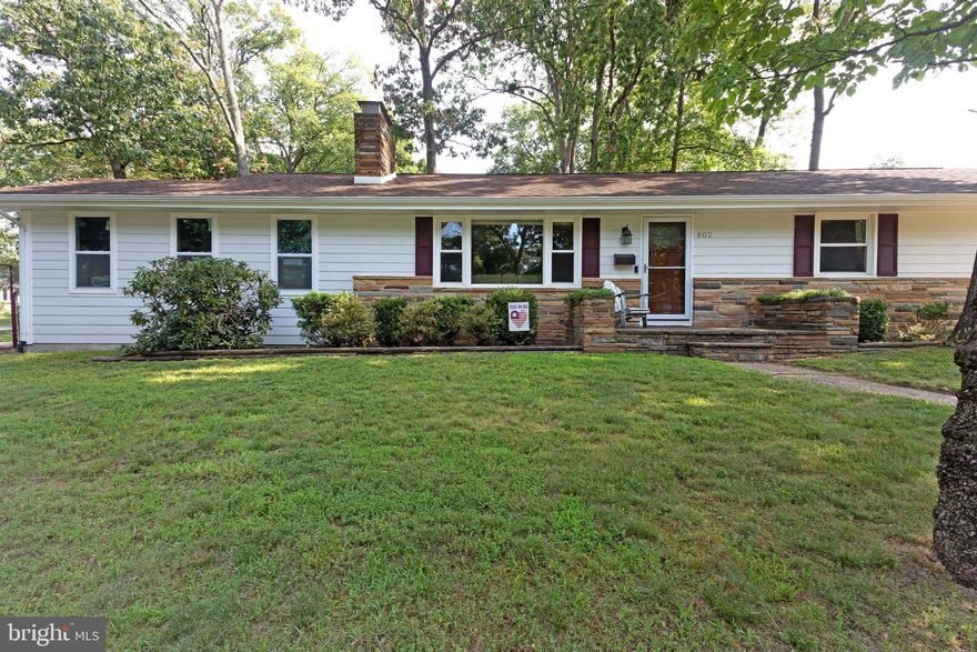 Welcome home!  Recent updates galore: furnace 12/2020, air conditioning 4/2021, carport converted to garage with permits 11/2016, front door 5/2017, Microwave 12/2020, fresh paint, Hunter Douglas shades.  Kitchen remodel in 2009 with granite counters,  full height light colored cabinets and soft close drawers, SS appliances, wine/beverage refrigerator, Hardiplank siding with stone/slate exterior front. Sunroom off kitchen with backyard and garage entry.  Hardwood flooring throughout main level and extra plush carpet in finished basement.  Kitchen has wood-look tile. Framed for shower in 3rd bathroom, which operates as a half bath now.  Beautiful spring landscaping in the front of home, Basement laundry room with workout area and two large storage areas.  Access to community water and boat pier.  Voluntary HOA fees of $25.