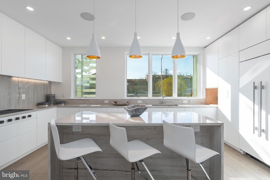 Only two homes left !! Moderna @ Rittenhouse. Possibly the last new townhomes to be built in Rittenhouse with the full 10 years of tax abatement. These eight revolutionary new homes have been designed by renowned architect Shimi Zaken of Atrium design group. Only a few remain. Each home has a 2-car garage, 6-stop elevator, 10 year tax abatement, and approximately 4,898 square feet of living space w/ amazing luxuries throughout. Each home has four bedrooms plus two additional rooms that can be used as bedrooms or offices. Moderna homes come equipped with Control-4 smart home systems included, 3-outdoor decks, roof deck with skyline views and optional plunge pool and outdoor kitchen. the entertaining level has a spectacular chefs kitchen with Wolf/Sub-zero appliances package, quartz counters with 2cm eased edges, and custom cabinetry with soft close hinges. the living room has partially double height ceilings, access to  a large deck, and a breathtaking staircase with custom railings. Moderna homes have a finished lower level with media room, wet bar and beverage center, custom closets throughout, four zones of energy efficient HVAC system, and much much more. Located on one of the most desirable blocks in the neighborhood, convenient to the Lombard Swim club, Rittenhouse Square Park, and every wonderful amenity that makes Rittenhouse the most sought after neighborhood in Center City. New Construction townhomes do not become available often in Rittenhouse! Moderna is located within the Albert M Greenfield School catchment. Some additional features include: Custom pivot hinge from door and magnificent front facade, 4 full bathrooms with custom tile work, frame-less glass showers, modern vanities with quartz counters, 3 half baths, full size laundry room with whirlpool washer and dryer included and stainless steel laundry sink, wood clad windows throughout, solid core interior doors, interior metal railing system, upgraded extra thick drywall, upgraded energy efficient hot water heater, alarm system, sprinkler system, designer lighting and plumbing fixtures and a world class design. Estimated Square footage total includes above grade space and below grade space and is estimated. It is the responsibility of the buyer to verify square footage and taxes.