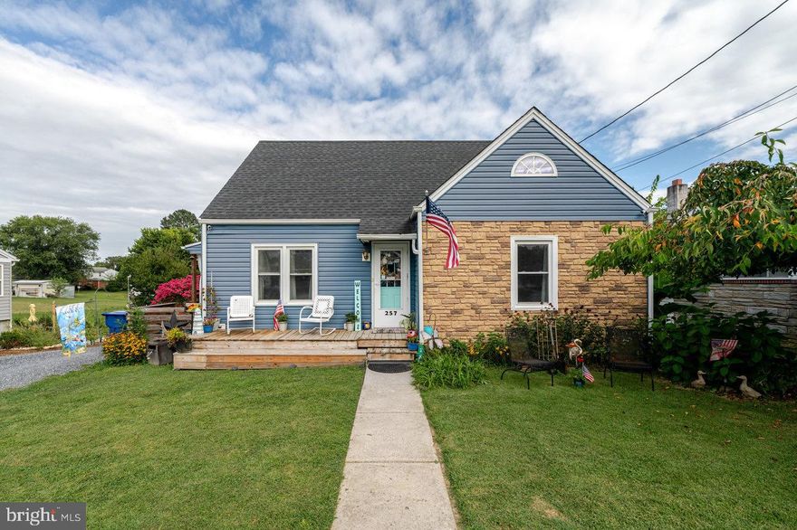 This adorable home is packed with character, comfort, and functionality! Featuring 2 bedrooms on the main level and 2 upstairs, the flexible layout is perfect for families, guests, or even a home office setup. The basement boasts elegant porcelain tile flooring and a convenient garage door entry—just add a drop ceiling to easily finish the space for extra living, entertainment, or hobby use. Car enthusiasts and hobbyists, take note! The enormous detached garage/shop is a true standout, offering 12-foot ceilings, full electric, climate control (including A/C), and hardwired ethernet connection. Whether you’re  working on projects, or just need serious storage, this shop delivers the perfect setup. Plus, there’s ample extra parking in the back—enough to accommodate three to four additional vehicles with ease.  Outside, you’ll find a perfectly manicured yard bursting with flowers and plants, creating year-round beauty. The back porch is ideal for entertaining, relaxing, or enjoying a peaceful morning coffee while soaking in the scenery. Outside, you’ll find a perfectly manicured yard bursting with flowers and plants, creating year-round beauty