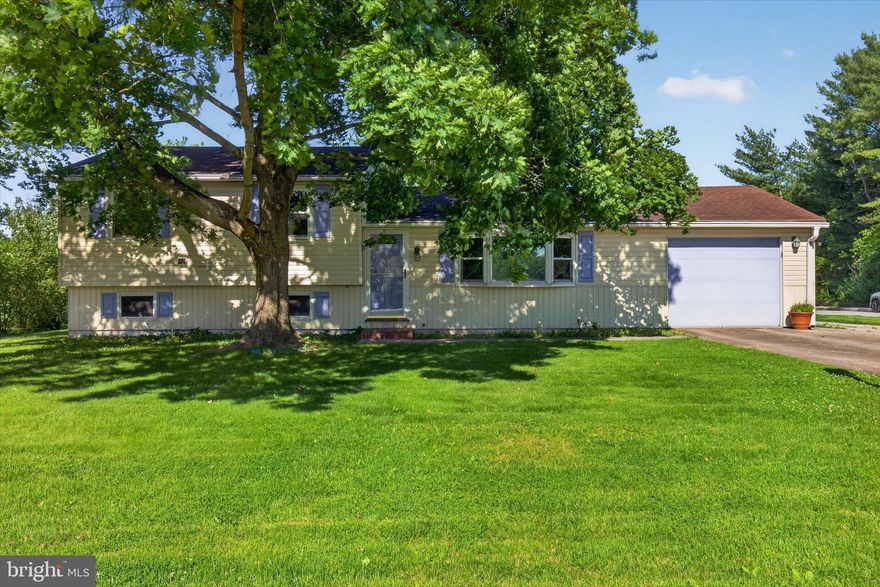 This split-level home sits on a flat .46-acre lot featuring a huge 24'x44' detached heated garage just outside of Jonestown. Located in Swatara Township and close to Swatara Creek, this property is the perfect find if you've been looking for an impressive garage setup, plenty of yard space, and a solid location. This home offers a quick commute to Fort Indiantown Gap, Harrisburg, and Lancaster, with easy access to Route 22 and I-81. The main floor features a living room with a wood-burning fireplace, a kitchen equipped with granite countertops, a brand-new Samsung gas stove with a built-in air fryer, and a dining area. The upper level has 3 bedrooms with new flooring installed in 2024, and 1.5 baths. Downstairs, the finished lower level features a recreation room that serves as a great extra living space or flex room, along with dedicated utility and storage rooms. The standout feature of this property is that detached, heated garage, which is cleverly split in two. The front half is wide open for parking, working on cars, or parking the boat, while the massive back half is a dedicated workshop and storage area that could easily make an awesome party spot or hangout room. Attached to the house is an additional 1-car garage for everyday parking. Out back in the yard, there is also a separate storage shed tucked away, giving you the perfect spot to throw the kayaks after a day out on the creek. The seller has taken care of several major mechanical items, including a newly installed whole-house Generac generator (2024) and an updated stand-up shower (2023). The house is being sold As-Is. It is a practical layout that just needs cosmetic updates, so bring your paint brush and your own ideas to finish it your way and build instant equity.  Schedule your showing!