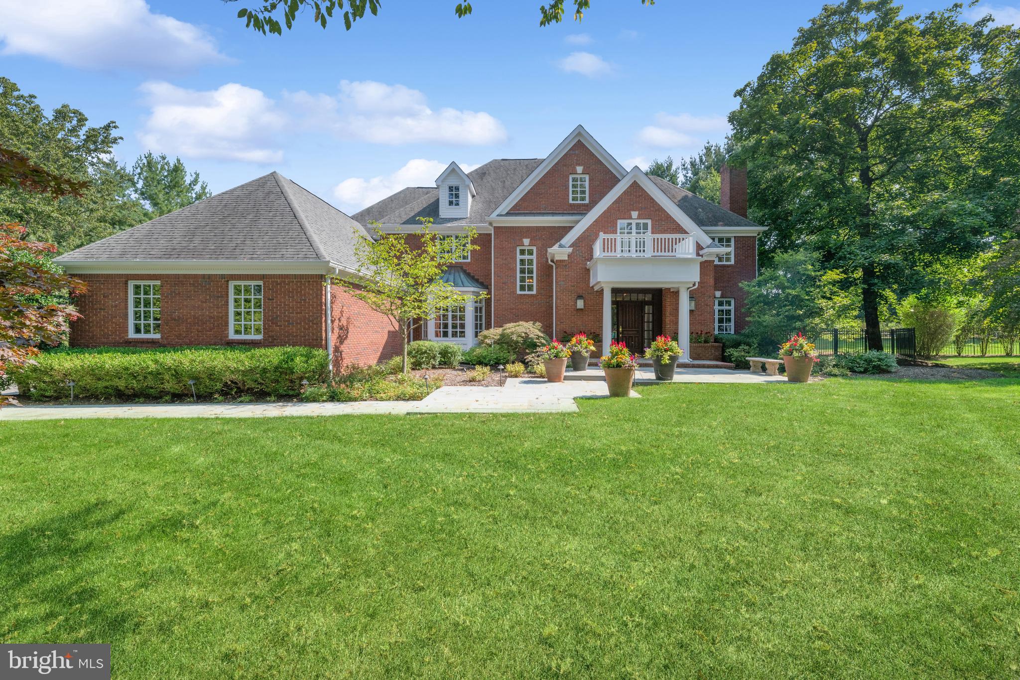 An idyllic location on a quiet cul de sac street provides the perfect backdrop for a thoughtfully designed, masterfully constructed custom home in the beloved Littlebrook neighborhood of Princeton. Every feature prized by today’s discerning homebuyer is beautifully represented, including a a first floor office with fireplace and pocket doors; a gourmet kitchen with high end appliances; a first floor full bath; a sprawling primary suite with sitting room, dual walk-in closets, and sumptuous en suite bath; a finished basement with full bath; a three-car side-entry garage; and a backyard retreat with a shimmering, in-ground pool, bluestone patios and impeccably groomed and professionally tended lawn. The well-equipped kitchen is centered by an expansive island with two prep sinks, storage cabinets and seating for four. The stainless steel appliances include a Wolf range, double wall oven, refrigerator and full-size freezer. A large walk-in pantry adds to the ample capacity of the custom cabinetry. A laundry/mud room off of the kitchen has additional cabinet space and a utility sink. A back staircase provides convenient access from the kitchen to the second level, which hosts the primary suite, two princess suites and a fourth bedroom. Crafted to cater to the refined demands of contemporary upscale living and situated just blocks from Littlebrook Elementary School, 49 Maybury Hill Road is the epitome of gracious living.