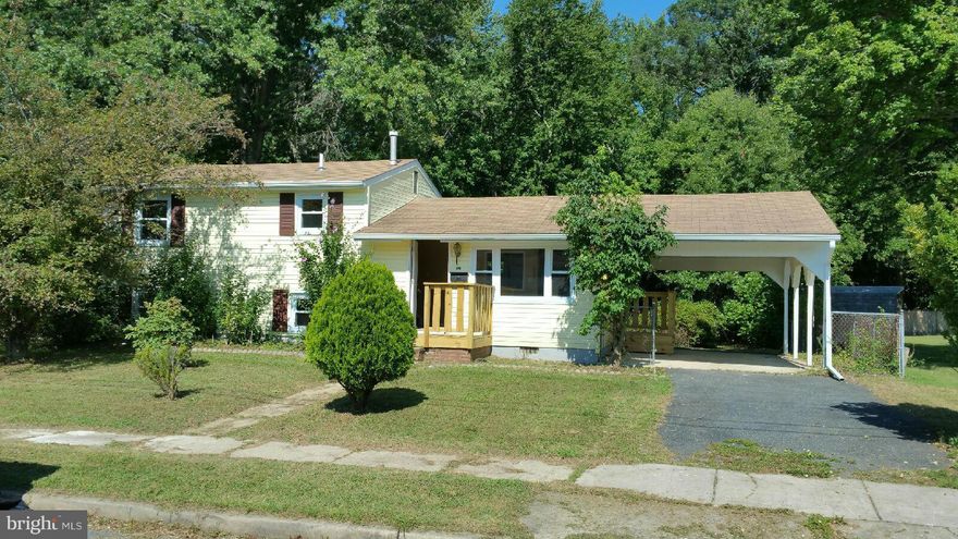 Suburban living at its best w/ everything you need. Newly remodeled kitchen with ceramic tile and new appliances. Bathroom updated with tile surround and ceramic floor. New carpet and paint throughout this lovely home. Central heat and air conditioning.  Carport for the rainy days. Huge fenced rear yard that backs up to woods. SCHEDULE YOUR SHOWING TODAY! Don't miss your chance to call this home!