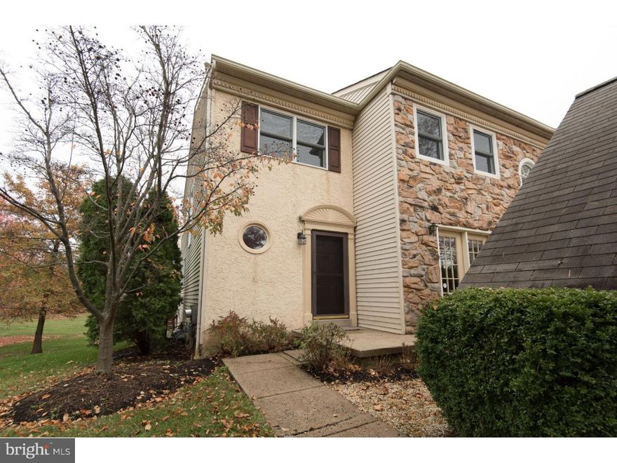 Beautifully maintained end unit townhome! The foyer entrance gives way to newer, gorgeous hardwood floors showcasing a fantastic floor plan. Spacious and open, the living room shines with a wood burning fireplace, natural light, and French doors that lead to the large deck overlooking the backyard common space.  A decorative light fixture adorns the dining room. Large and bright, the kitchen offers tons of cabinet and counter space, tile backsplash and recessed lighting.  A half bath and 1 car garage with additional storage complete this level. Upstairs an open landing leads to an oversized master bedroom with master bath showcasing dual sinks, large soaking tub, and a separate glass shower. 2 additional bedrooms are serviced by a full hall bath.  All new carpet on the stairs and second level. The full finished basement offers a large rec room area, separate room that would make a wonderful office or possible 4th bedroom with custom built-in shelving, laundry room, storage, and a head start to a 2nd half bath.  Walk out the basement door to the lovely backyard/common space with a private storage shed.  Updates include newer hardwood floors, new garbage disposal, updated washer and dryer (included), and newer hot water heater. Conveniently located close to shopping, restaurants, parks, and in the top rated Upper Dublin school district!