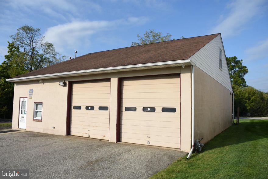 Versatile commercial space in a great location! Currently operating  as an auto repair shop, this property is zoned "Village Commercial" which allows residential and a multitude of retail, service or other commercial uses. For those interested in keeping the current use, the sale includes 3 fully functional hydraulic lifts and an assortment of other auto repair necessities. Two large garage bays open into a spacious shop with high ceilings. The front door opens into a reception area. Upstairs you'll find plenty of extra space for storage, a private office and a bathroom.  The front lot has plenty of parking and the side lot allows space for outdoor storage and utilities. It's a simple as it gets, over 3000 sq ft of flexible commercial space with lots of parking in a prime location.
