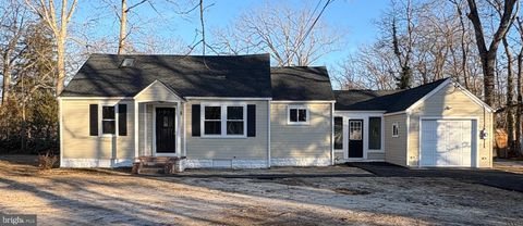 Photo of 4 W Lakeshore Drive, BROWNS MILLS, NJ 08015 (MLS # NJBL2102938)