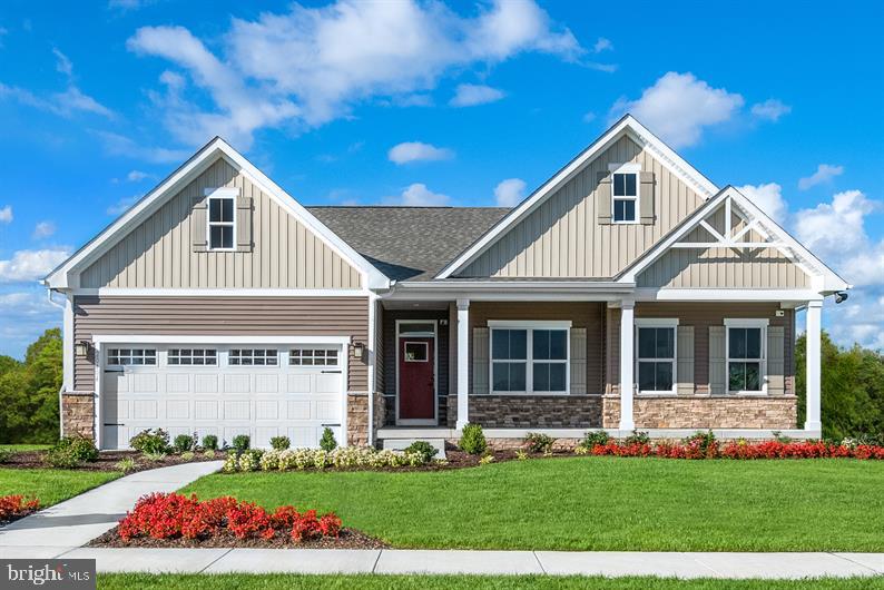 The CUMBERLAND in the Ryan Homes brand new community of Caple Ridge with 1+ acre homesites and easy access to routes 140 & 32, and I-795 making Westminster, Owings Mills, and Downtown Baltimore all just a short drive away. Different exteriors to choose from and up to 5 Bedrooms, 4 Baths, a covered rear Porch and 2-car or optional 3-car Garage. This ranch style home has a cozy covered entry that says "welcome home". Through the foyer and off to the left 2 bedrooms and full bath offers other members of the family and guests privacy. Ahead the spacious great room is waiting to host the next family game night or neighborhood gathering, while the open flow into the kitchen, dining and covered rear porch play the perfect co-host. The primary bedroom is just steps away in its own private corner of the home and features two walk-in closets, private bath and access to the rear porch. The lower level has a full unfinished and spacious Basement providing plenty of space for additional living area and storage. The Cumberland gives you the space of two levels and the convenience of one! Photos are representative only.