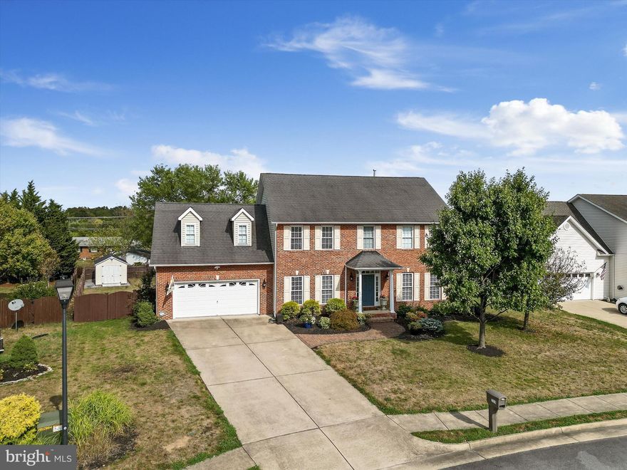 PRICE IMPROVED!!! Welcome to 113 Lariat Ct. Stephens City VA ., Nestled in a quiet cul-de-sac on just over a quarter acre, this brick front home is a must-see! Offer 4 bedrooms, 3.5 baths and over 2,600 Sqft. of meticulously maintained living space!

Step inside, the home shows beautifully! Featuring two spacious primary bedrooms with en-suite bathrooms and large walk-in closets. The convenience of a bedroom-level laundry room with a generous utility sink ensures easy maintenance. Solid hardwood floors on the main level flow seamlessly into the upstairs hallway, where you'll find abundant storage in oversized bedroom closets and two linen closets.

The kitchen is a chef's delight with a Wi-Fi enabled double oven featuring built-in air fryer and temperature probe, along with ample storage including a pantry and a dedicated kitchen desk area. The open floor plan extends into a large dining area and great room, perfect for entertaining. For larger gatherings, there's an additional separate dining room.

On the lower level, a formal living room offers space for hosting guests or creating a play area for kids. Outside, a fenced and level backyard provides privacy and a serene space for relaxation. You'll be welcomed by a custom brick walkway and meticulously designed landscaping at the front door.

Inside, the first floor boasts 9-foot ceilings, creating an expansive atmosphere throughout. The basement is primed for future finishing with a French drain installed around its entire perimeter. Included amenities like a water softener ensure supreme drinking and shower water quality.

Additional features include an upgraded detached storage shed with electricity and ample extra space, as well as an oversized garage with built-in storage solutions including a workbench, tool board, and cabinetry. A gas water heater and fireplace ensure endless comfort with hot showers and cozy evenings.

This home combines comfort, functionality, and thoughtful design elements, making it an ideal choice for modern living and entertaining. So schedule a tour today, this beautiful brick-front home wont last long!

***Ceilings in both front formal rooms have been reverted back to neutral paint***