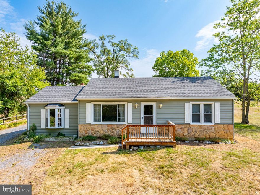 Charming 2-bedroom, 1-bathroom ranch-style home located just outside of Mount Jackson, Virginia. This home features over 1,200 square feet on the main level, a basement with finished and unfinished living space, a level yard, outbuilding and several recent updates over the years, including siding, roof, front porch, oil furnace, sump pump, well (home previously on a cistern), water softener, and water heater. Enjoy the convenience of being close to the Town of Mount Jackson and Interstate 81. Home is being sold, “as is, where is”.  Two parcels totaling .45 acres.  Don't miss this opportunity, call and schedule your showing today!