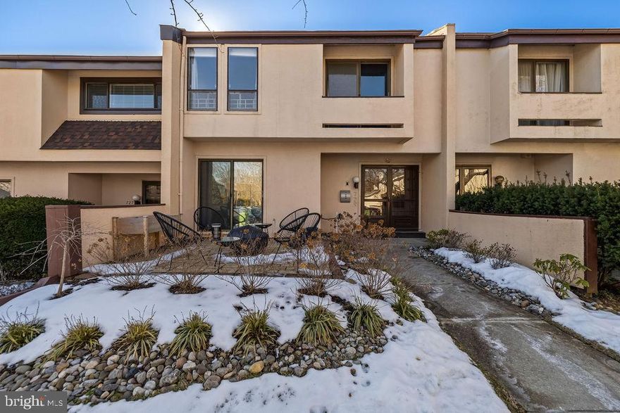 Rarely available Roland Springs gem, nestled in Roland Park, this mid century style modern townhome has it all! Step into the foyer and immediately appreciate the original slate floors and open tread oak staircase with oak handrails and wrought iron spindles. The foyer grants access to a freshly revived powder room and the newly renovated kitchen with all of the amenities you could hope for!  The kitchen features engineered hardwood flooring throughout, recess-panel wood cabinetry including peninsula/breakfast bar, quartz counters and a clean and contemporary chevron tile backsplash. Appliances include an LG stainless steel French door refrigerator with water/ice dispenser, Samsung stainless steel electric range with warm zone and a Whirlpool stainless steel built-in microwave and stainless steel dishwasher. The stylish and inviting breakfast area has matching base cabinets and counters, wall mount shelving and sliding glass doors to Patio. The kitchen leads to a nicely sizing formal dining area as well as an impressive 2 story family room with maple hardwood flooring, a contemporary wood burning fireplace with slate surround and hearth, an overlook from the 2nd floor hall and a back patio deck. 

Upstairs you’ll find the primary suite with Maple hardwood flooring, a double closet, a dressing area with vanity and a newly renovated primary bath.  Down the hall leads to 2 additional bedrooms, one with a deck and a shared hall bath.  

The lower level is fully finished and perfect for entertaining, a play room or an exercise space or a combination of all.  There is an ample size combined storage and laundry room off the main area as well as an additional full bath and an outdoor patio area leading to a grassy common area perfect for having a catch. 

The convenience factor of this location can’t be beat. Roland Springs is just a hop skip and jump away from Miss Shirley's, Roland Park Bagel, Smoothie King, Alonzo's, Stony Run trail, the Rotunda, Roland Park Library, Tuxedo Park and Hampden and so much more.  Enjoy Summers by the community pool which is included in your HOA.  Look no further- this is the THE ONE!