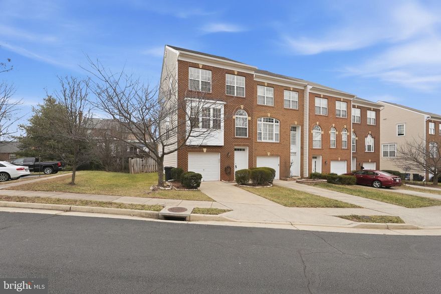 This is the one you’ve been waiting for — where location, lifestyle, and peace of mind come together effortlessly.

Set in the heart of Sterling, this stunning brick-front end-unit townhouse offers space, light, and thoughtful upgrades at every turn — all complemented by low HOA fees that enhance long-term value. Just minutes from Dulles Town Center, Costco, dining, entertainment, and everyday essentials, the location delivers true convenience without sacrificing comfort.

Inside, the home unfolds across three beautifully finished levels, all meticulously maintained and recently refreshed. The main level features gleaming hardwood floors and a stylishly updated kitchen with granite countertops, refinished cabinetry with new doors and hardware, and a professionally installed gas range — perfectly suited for both everyday living and entertaining. 

Upstairs, the primary suite is a true retreat, highlighted by a remodeled spa-like bath with a double vanity, sleek shower door, and a rolling barn door that adds modern character. A custom closet installation elevates organization, while additional bedrooms offer generous space and versatility.

The walk-out lower level provides a fourth bedroom, full bath, and flexible living space ideal for guests, gatherings, or a home office. A fully remodeled bath with added standing cabinetry enhances both function and design. Outdoor living is equally impressive with an elevated stone patio, an upgraded deck with new support framing and handrails, and smart water-management features including a French drain system and upper-deck water diversion — all designed for long-term enjoyment and peace of mind.

Behind the scenes, major investments have already been made for the next homeowner: a new HVAC system, serviced water heater, full new roof, refreshed gutters, updated bathrooms, freshly painted interior, and rejuvenated exterior trim. Every detail has been thoughtfully cared for — allowing you to move in and simply enjoy.

With an end-unit setting, a one-car garage, multiple parking options, low HOA fees, and a location that truly has it all, this home is ready to welcome its next chapter.

Schedule your private showing and experience a home that makes everyday living feel elevated 

— Love Being Home.