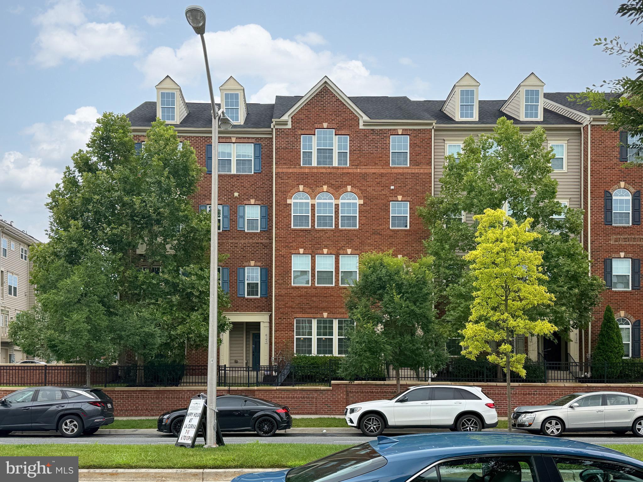 Beautiful brick front two-level condo townhome with modern open floor plan, formal living & dining, oopen gourmet kitchen with Stainless steel appliances, granite countertops, chief's cabinets. Spacious owners suite with private bath features dual vanities, granite counters, stand up shower and soaking tub. Dual closets, and 9 ft ceilings. Great community features private shuttle to the metro, near by restaurants, walking tails, community park, kids playground, and walking distance to lake Artemesia. Brand new flooring, fresh paint throughout. Move in ready!