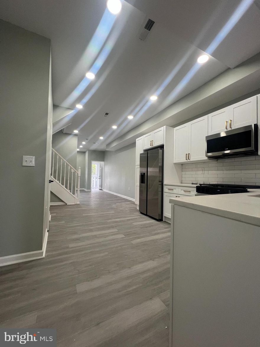 Investor’s Advantage – Two Properties, One Package Deal!

This is your chance to turn someone else’s loss into your gain. 2543 Edmondson Ave, a spacious 5-bedroom, 3-bath home, is available AS-IS at a reduced price of $225K—a significant drop from its previous list price of $265K. With rental potential of up to $2,600/month under Section 8, this property offers strong cash flow once updated.

Next door at 2545 Edmondson Ave, framing is complete and mechanicals are ready to be added, giving you the freedom to finish the project to your standards. Priced at $175K, this property provides the perfect complement—together, both homes create a rare opportunity to maximize returns in a high-demand rental market.

Package them for just $400K total and position yourself for long-term income. Ideal for investors with vision, resources, and the drive to transform these properties into profitable assets. Don’t miss this chance to step into instant equity and future earning potential.

Welcome to a masterfully reimagined residence where historic charm meets modern sophistication. This stunning 5-bedroom, 3.5-bath home has been renovated from top to bottom, offering timeless character blended with luxurious upgrades designed for today's lifestyle.

From the moment you step inside, you'll be captivated by the expansive open-concept main level, drenched in natural light and enhanced by sleek, contemporary flooring. The spacious living and dining areas seamlessly flow into a chef-inspired kitchen, featuring pristine quartz countertops, stainless steel appliances, custom cabinetry, and ample prep space—perfect for both everyday living and elegant entertaining.

A versatile first-floor bedroom or home office opens to an oversized rear deck, ideal for morning coffee or evening gatherings. Upstairs, you'll find two generously sized guest bedrooms, a fully updated hall bath, and a beautifully appointed primary suite complete with a spa-like en-suite bathroom. Thoughtful design details, such as the charming window alcove and restored original banisters, pay homage to the home's rich architectural heritage.

The fully finished lower level expands your living space with a large family room, an additional bedroom, a sleek guest bathroom, and a dedicated laundry area—ideal for multigenerational living, guests, or a private retreat.

Recent upgrades include a new roof, new windows, brand-new systems and appliances—making this home completely move-in ready.

Located just minutes from the heart of Baltimore City, this home delivers a rare combination of space, style, and convenience.