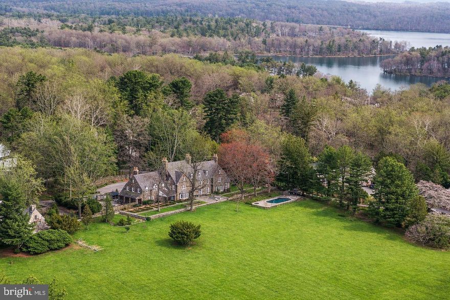 ESSENCE
Live authentically. Hewn from ashlar stone between 1926 and 1930, Wynddon Estate rises above nearly seven acres of sculpted grounds overlooking the glittering expanse of Loch Raven Reservoir. A French manor estate steeped in history, whose architecture will endure. Six fireplaces anchor rooms dressed in original wood paneling and ornate millwork, where craftsman-era proportions quietly command every space. Old soul intact.
Unrivaled setting. Walled gardens spill into sweeping lawn and panoramic vistas as koi ponds catch the light. Raised herb beds sit steps from your kitchen door. Revel in the joy of growing your own herbs and veg. Outdoor living aesthetics were inspired by the Chartres Cathedral in France. A crystal pool perches at the landscape's edge, framing summer reservoir vistas with cinematic ease. Expansive stone terraces reach into the landscape and invite you to slow the pace of life. 
Lovingly restored, thoughtfully modernized, the primary suite offers genuine repose, its luxe bath a private sanctuary. Authentic materials, textures, proportions... the sense of place is captivating. A once in a lifetime property. Cultivate your existence. The art of uniting human and home.

LOCAL FLAVOR AND PROVISIONS
John Brown Store and Wegmans. Favorite local dining at Peerce's Plantation, The Milton Inn, The Oregon Grill, The Butler Cabin, and The Filling Station. An exit north offers Graul's Market along with Casa Mia’s, Manor Tavern, Woodfire Kitchen and The Creamery Connection. Tap into local breweries, such as Inverness Brewing, Farmacy Brewing and Big Truck Farm Brewery.

OUTINGS AND LEISURES
Explore the NCR Trail. A 21-mile flat, crushed-stone trail open to hikers, bikers, and horses, it runs along the scenic Gunpowder Falls river. Go tubing on the Gunpowder River. Loch Raven Reservoir offers scenic beauty and water activities. Enjoy Ladew Topiary Gardens... these gardens are 22 acres of spectacular, award-winning gardens, more than 100 remarkable topiaries, a mile-long Nature Walk, and native Butterfly House. Explore The Manor Mill, a pre-revolutionary grist mill that now houses a wide variety of art and entertainment events. Tee off at Hunt Valley Country Club Golf Course or Pine Ridge Golf Course. Or visit The National Lacrosse Hall of Fame and Museum which honors the history and legends in the sport. 

PROXIMITY
Zippy access to the I-83 on ramp, about 13 minutes to Hunt Valley, and about 14 minutes to Towson. 48 minutes to BWI and 26 minutes to Penn Station. Approximately 1 hour 45 minutes to DC.

REGION
Established in the 1700s, the village was once an old mill town. It notably served as a filming location for scenes in John Waters' 1972 film Pink Flamingos.