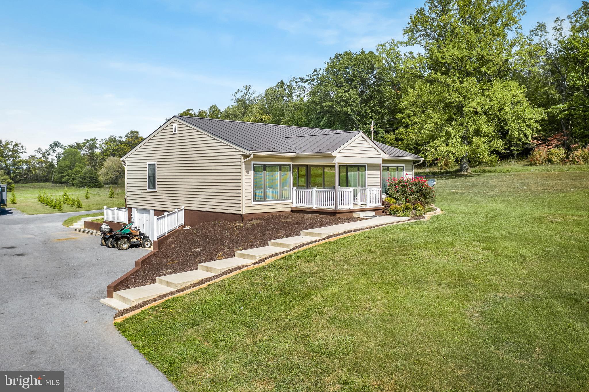 Completely renovated in 2015 including a new metal roof, all new flooring and finished basement with a full bath. Nice flat level lot located in a desired area. Oversized back porch great for entertaining. Large kitchen featuring an island, wall oven, plenty of cabinet space and an abundance of natural light! Separate dining room , large pantry and beautiful floors throughout.