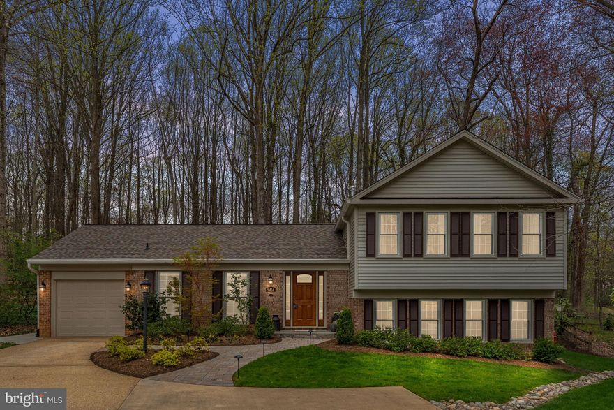 Location, Oasis, Location, Oasis! It's not often you see these two words combined.  This unique 2-level Split Foyer is nestled in a quiet residential neighborhood, but is less than 5 minutes from Metro Bus Station 17 and Fairfax Connector Bus Station 495. You'll be in DC in no time with easy connections to the VRE, and quick access to 495 if you prefer to drive.

This meticulously maintained home will wow you at every corner. A spacious foyer leads you into the open floor plan great-room and kitchen.  The cabinet-packed kitchen offers Corian countertops and SS appliances which include a double oven and a gas cooktop. A quaint peninsula offers a second sink and built-in desk area, with more storage above.  The light-filled sunroom is the most relaxing spot of this home, with a lot of room for sitting and looking out at the spectacular yard. 

All the bedrooms are on the second level, and all feature hardwood floors and abundant closet space. The primary bedroom has a gorgeous en-suite bathroom, with beautiful cabinetry and a large walk-in, fully tiled shower. The three secondary bedrooms share a remodeled hall bathroom, with a fully tiled tub-shower combo. 

The lower level offers a fantastic space which can have many uses. The spacious family room has built-ins and walks out to the patio. There is a half bathroom and office just down the hall, which can easily be turned into a 5th bedroom and full bathroom.  A spacious laundry and storage area complete this space. 

Remember the "Oasis" part? That's what you will find in this home's backyard. Surrounded by mature trees and impeccable landscaping, you will find yourself spending a lot of time here.  A two-level stone patio offers two different seating areas, perfect for entertaining friends and family or just relaxing a cup of coffee or a glass of wine.

Don't miss out on this home, because just like the Solar Eclipse, it will be gone before you know it!