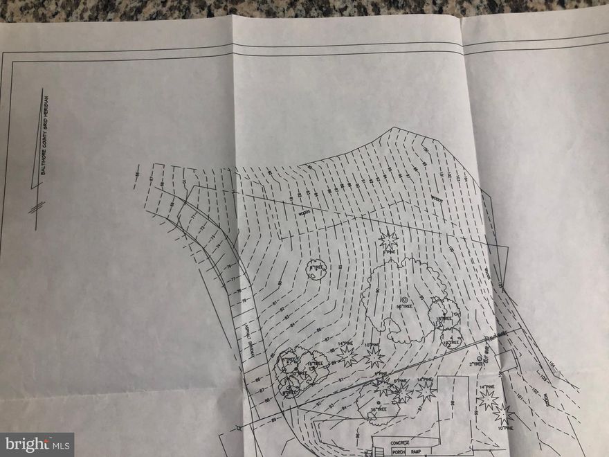 Wonderful opportunity to build in a lovely area caller Poplar Hill, just a few minutes off 83, with direct access to Mt Washington and Hampden.   Seller believes the lot to be .25 (1/4) acre and able to be developed to a home site.  Existing home shown in the photos is on the lot just south of the subject and shares a driveway.  New owner will have access to city water, but will need to extend the sewer line, located approx  144' from the lot line.  New owner will work with seller to allow sewer hook up to extend to existing home on the lot just south of the subject, known as 1012 Poplar Hill Rd.    Similar lot was recently sold at 1125 Bellemore Rd. just one block away.  Photo gallery in this listing offer images of the foundation being installed at the Bellemore Rd site, also located on a similarly sloped lot.