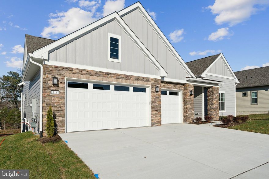 Welcome home to Trilogy at Lake Frederick, the area's premier 55+ community featuring amazing amenities including an expansive recreation facility with indoor and outdoor pools plus the Shenandoah Lodge with dining, drinks, a private lounge, and much more.<br><br> 

This newly built, ready-to-move-in Baldwin model features 4 bedrooms, 3 full bathrooms, a half bathroom, main-level primary suite and guest suite, a walkout finished lower level with a bedroom & full bath, and a covered patio with a multi-slide door, indoor & outdoor fireplaces, and an uncovered extended deck. There is more than 4,000 sqft of living space including a spacious main-level primary suite. Enjoy the open layout floorplan of this Baldwin that's perfect for entertaining guests with over $388,000 in builder upgrades including gorgeous engineered hardwood floors on the main level and gas fireplaces in the great room and on the covered deck. The kitchen offers upgraded KitchenAid stainless steel appliances, and Shea Home's Signature Kitchen layout. This home is situated on a premium wooded homesite ($55,000 lot premium) and has an irrigation system included. <br><br>

This is the 55+ community you've been searching to find with incredible amenities that will keep you excited to enjoy every season. Explore the expansive Shenandoah Lodge with its farm-to-table restaurant Region's 117, ballroom for events, Crow's Nest club for members-only, arts & crafts room, culinary experience room, and so much more. Next door there's even more with the recreation facility featuring an indoor and outdoor pool, exercise equipment, pickleball courts, tennis courts, and the list goes on. Ask about Shea Mortgage's closing cost assistance. Discover your new home, new adventure, and new Active Adult community in Trilogy at Lake Frederick!