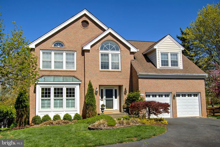 Welcome to this stunning 5-bedroom, 3.5-bath home in the sought-after Lowes Island community! Lovingly maintained by the original owner since its construction, this home boasts beautiful hardwood floors throughout most of the main level. The kitchen features white cabinetry, granite countertops, a natural gas cooktop, and double wall ovens, with a sunny bay window in the breakfast area. The inviting family room offers cathedral ceilings, skylights, and a cozy wood-burning fireplace.  Upstairs, you’ll find four generously sized bedrooms and two fully remodeled bathrooms. The finished walk-out basement includes a fifth bedroom, a third full bath, and even a wine closet for your collection!   Recent updates include: HVAC (2 zones): 2022 and 2017, remodeled hall bath: 2021 , remodeled primary bath: 2017, roof: 2014, gas water heater: 2007,  all windows replaced: 2001.  This neighborhood offers exceptional amenities, including pools, tennis and pickleball courts, tot lots, two fitness centers, and scenic walking paths.  Plus, Lowes Island Elementary School is just a short walk away via a convenient walking tunnel located behind the house.  Don’t miss this opportunity to make this incredible home yours!