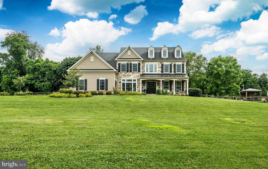 A Rare Gem in Chester Springs!

Welcome to this stunning custom-built home, just 8 years young, blending modern luxury with timeless farmhouse elegance. Thoughtfully designed with energy-efficient Smart Home technology, this property is perfectly situated on 2.29 picturesque acres, surrounded by the scenic trails of Bryn Coed Preserve and a short stroll from the charming village of historic Birchrunville.  Inside, the main level showcases a gourmet kitchen that’s sure to impress. Featuring gleaming Carrara marble countertops, two-tone cabinetry with accent lighting, a spacious center island, upgraded stainless steel appliances, a farmhouse sink, convection microwave, and a breakfast bar—this kitchen flows seamlessly into a bright, window-lined Sun Room with patio access. Adjacent is a vaulted Family Room with a striking floor-to-ceiling stone fireplace framed by large windows offering stunning views. Additional main level highlights include a formal Dining Room with tray ceiling, custom moldings, and a butler’s pantry; a spacious Living Room with recessed lighting and crown molding; a private Office/ Playroom/Hobby Room; stylish Powder Room; and a well-organized Mudroom with custom-built cubbies for easy everyday living. Take the back stairs to retreat to the luxurious Owner’s Suite, featuring an expanded walk-in closet and a spa-inspired bath complete with radiant heat flooring, an oversized walk-in shower with rain showerhead, and double quartz vanities. The center hall offers views to the family room below. Continuing down the hall you'll find a private Princess Suite with its own tiled bath, two additional bedrooms with ceiling fans, a hall bath with double vanity, and a convenient second-floor Laundry Room which completes the upper level. The walk-out Basement offers 9-foot ceilings, rough-in plumbing, and endless potential for additional living space or storage.  Step outside to your private oasis, complete with a fenced yard, flagstone patio with built-in grill, 12x12 garden with animal shelter, swing set, a salt-water Arista pool with in-water lounge chair platform complete with umbrella access, heated spa with water-fall, private shaded Pavilion with TV and speakers, and a new 10x12 shed. The property borders a 29-acre deed-restricted parcel that permits only one home, ensuring continued privacy and scenic views. Energy-saving features include Energy Star-rated appliances, windows, and doors; two-zone high-efficiency HVAC; enhanced insulation; solar paneled roof and LED lighting throughout. Smart Home amenities include a Nest WiFi thermostat, Lutron wireless switches, USB charging outlets, Smart Hub wiring,  ADT security, and a 5 camera Blink System.  Additional features: handscraped hardwood floors on most of the main level, an expanded three-car side-entry garage, stone façade with black metal porch roof, whole-house water filtration system, whole house humidifier, remote ceiling fans, and a full-house generator. All of this in a peaceful country setting just minutes from Routes 100, 401, 23, 113, and the PA Turnpike. 
 Welcome home to the beauty and tranquility of Chester Springs!