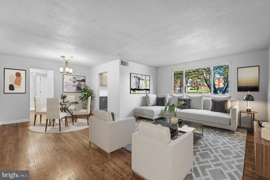 Motivated Seller.  Discover one of Hyattsville's hidden gems!  Welcome to this beautifully updated and light-filled 2-bedroom, 1-full bathroom condo, perfectly situated in the heart of vibrant Hyattsville.  Freshly painted and featuring hardwood floors throughout, this unit offers a spacious living area with a designated dining space.  The kitchen has been fully renovated with new appliances, and the hallway is highlighted with recessed lighting.  Both bedrooms are generously sized, offering ample closet space.

This condo includes two parking spaces (one assigned and one unassigned), an on-site laundry facility, and well-maintained grounds for your convenience.  

Situated in a prime location, you'll have easy access to the Metro, public transportation, shops, restaurants, the University of Maryland, and so much more.  With Washington, D.C., Baltimore, and Annapolis just minutes away, this move-in-ready condo provides the perfect blend of convenience and lifestyle.  Don't miss out - schedule your private tour today!