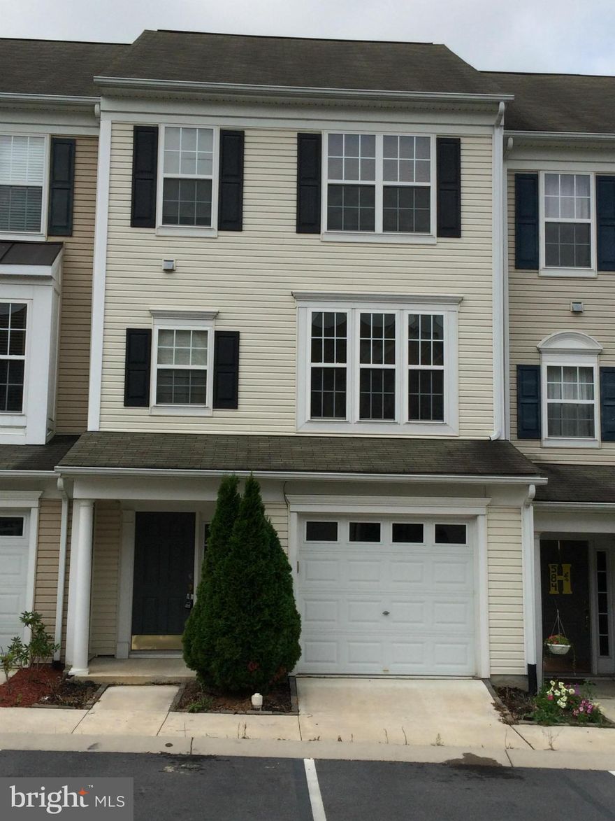 Nice Townhome. Finished family room in lower level, 1 car garage and 2 parking spaces. Open kitchen with large dining area, pantry, desk and access to a 18 x 14 deck. Master with walk-in closet and full bath with soaking tub. Rough in bath in lower level could easily be finished.