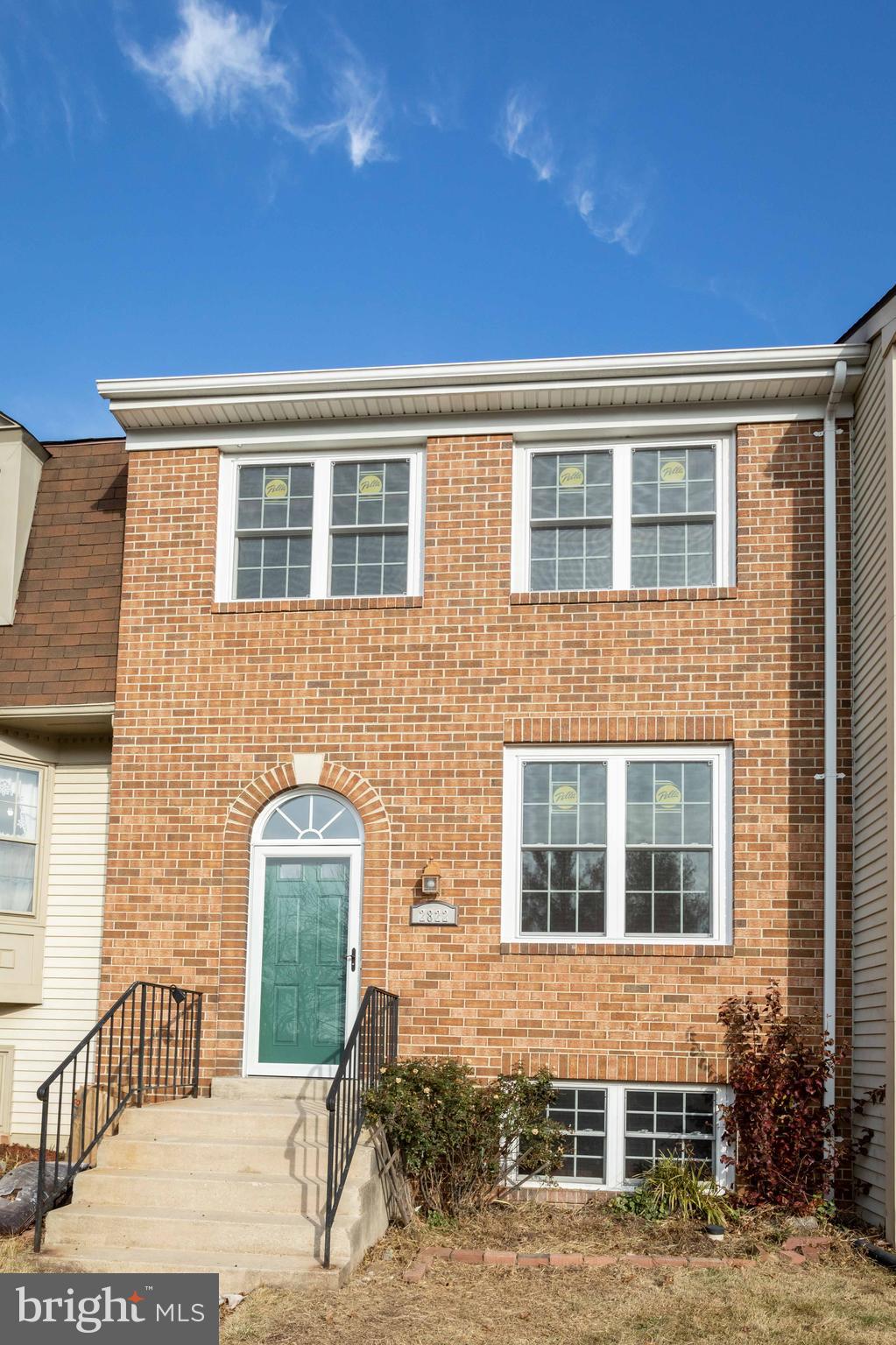 REMODELED FROM TOP TO BOTTOM IN 2018! FANTASTIC BRICK TOWNHOUSE W/ THREE FULLY FINISHED LEVELS. UPGRADED THROUGHOUT WITH NEW WINDOWS, FLOORING, DOORS, BATHROOMS, AND PAINT. HOME BOASTS HARDWOOD FLOORS IN LIVING RM, DINING RM, AND KITCHEN. KITCHEN IS FULLY EQUIPPED W/ STAINLESS STEEL APPLIANCES, PLENTY OF TABLE SPACE, AND TRANSITIONS TO A LARGE BACK BALCONY OVERLOOKING THE PARK/ COMMUNITY PLAYGROUND. UPSTAIRS BOASTS THREE LARGE BEDROOMS AND TWO FULL BATHS (INCLUDING A MASTER BATH). WALK OUT BASEMENT HAS A SUNNY 4TH BR WITH A FULL BATH, REC. ROOM AND A BRICK FIREPLACE. WORK ROOM DOWNSTAIRS AS WELL. FENCED REAR YARD WITH BRICK PATIO AND COOKING STOVE IS ADDED BONUS. TWO PARKING SPACES AND VISITOR PARKING AS WELL. CLOSE TO SHOPPING, COMMUTER ROUTES, AND PUBLIC TRANSPORTATION.