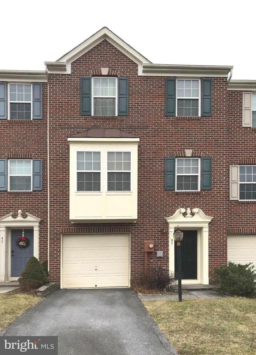 Beautiful, well maintained townhome backing to trees. Featuring 3 bedroom, and 2.5 baths, this brick front townhome has lots of added space with bump outs on all three levels. The kitchen has a new stainless steel dishwasher and oven, and in additional to an island it has room for a table. Next to the kitchen is a large morning room/dining area, the possibilities are endless on ideas for use of this space. The oversized Main bedroom has a large sitting area and a spacious walk-in closet. Fresh paint both inside and outside. This home has an unfinished bonus space on the walk-in level, with a rough for an additional full bath. There is a one car garage and a paved driveway. No more cutting grass as it is included in the HOA dues. Conveniently located near mailboxes, common area, and school bus stop. Just minutes to Harpers Ferry, nearby shopping centers, downtown Charles Town, and nearby commuter routes to Virginia and Maryland! Schedule your showing today as this opportunity will not last long.