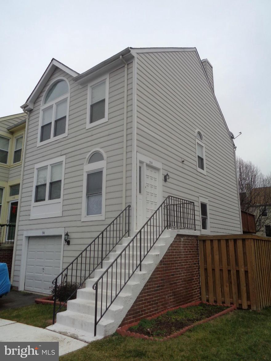 Light-filled spacious End Unit townhouse with Fireplace and One Car Garage.  Newer updated carpet and flooring.  Recent appliances and HVAC.   Finished lower level with wood burning FP, walkout to patio in private fenced back yard.  Living Room Deck leads to Entertainment Deck. Beautiful setting with So much open space and adjacent treed common area. Convenient Location close to everything!