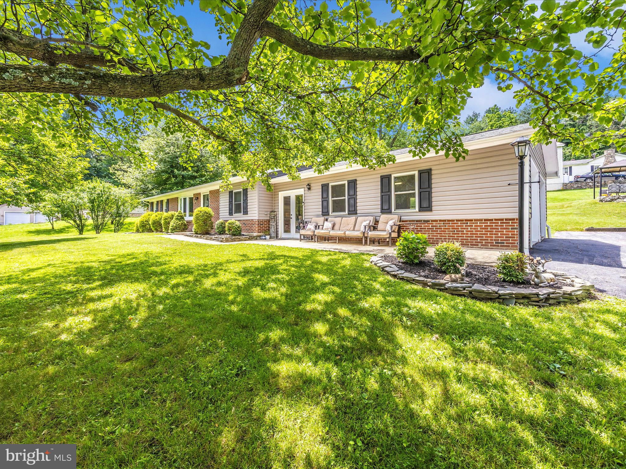 BACK ON THE MARKET!
IF YOU LOVE THE BLUE RIDGE SUMMIT AREA and prefer mountain community living, then this home might be for you! Fully renovated brick rancher with an oversized 2 car garage on a private lane that's shared by just a few neighbors. Nothing to do but move in and enjoy your summer. 3 bedrooms, 2 full bathrooms, hardwood floors, fireplace wood stove insert. Enclosed breezeway. Renovated fully equipped kitchen and bathrooms, replacement windows, roof and HVAC less than 10 years old. Full basement ready to be finished into a recreation room or used for all your storage needs. Outside you'll find a front porch, rear patio, a second patio with pergola and shed for your lawn equipment. Paved private lane with shared maintenance duties. Only a half hour to Gettysburg, DC/Baltimore area and 10 minutes to Walmart/Lowes, restaurants and more. Only 15 minutes to Waynesboro hospital, YMCA and downtown Waynesboro. Surrounded by natures playgrounds-Michaux Forest including the near by Appalachian Trail and local parks such as the historical Pen Mar Park visited by many past presidents and dignitaries in the early 1900's and if you are a civil war buff, you must check out the Monterey Pass museum and look out.