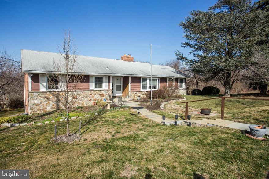Beautiful custom built Rancher with fantastic southern exposure farm views from the living room front windows - this two bedroom two-and-a-half bath home with possibility for third bedroom all on the main level boasts gorgeous hand pegged hardwood floors, stunning brick fireplace, Four Seasons sunroom, laundry room on the main floor, Master with walk-in cedar closet, Partially finished basement with full bath as well as a historic Peach Bottom