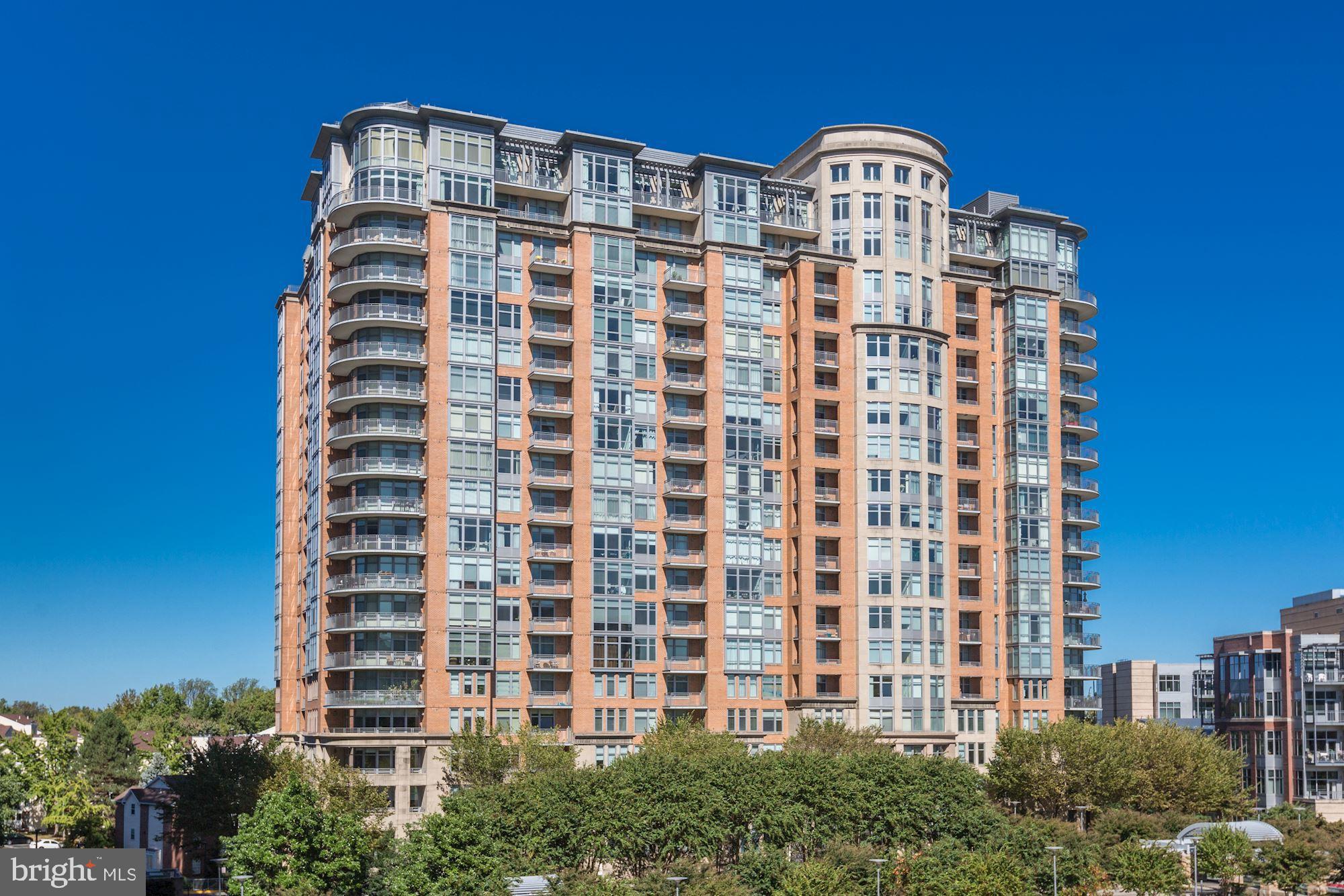 Charming 4th Floor 1 BR, 1 BA Unit overlooking Courtyard in luxury One Park Crest. Spacious Layout 818 sq. ft. plus Balcony. Enjoy year-round Sunset effects from Balcony and from inside the unit. Gleaming Brazilian Cherry Dark Hardwoods in Living Room and Kitchen. Granite Countertops, Stainless Steel Appliances. One parking space P2-069. Building amenities include a first floor Exercise Room, Library-Meeting Room, Guest Suites on paid basis, Lobby Wi-Fi. The amenities continue on 18th floor - Renovated Club Room (has TV and Wi-Fi) with views from DC to the Shenandoah, Rooftop Deck, Dipping Pool. Harris Teeter and Starbucks are literally next door in the Park Crest Master Complex. Fairfax County Connector Bus stops a block from One Park Crest and goes to Tysons Silver Metrorail station that is just under a mile away. One Park Crest is 11 to 15 miles north-west of Washington DC depending on the route taken and is just under 12 miles to Washington Dulles International Airport (IAD). Lots of dining, entertainment and shopping options abound within half-a-mile to two miles - Including Capital One Center for the Performing Arts to the east, Wolf Trap Center for the Performing Arts (and summertime outdoor concerts) to the west and of course the Tysons Galleria Mall within blocks of One Park Crest.