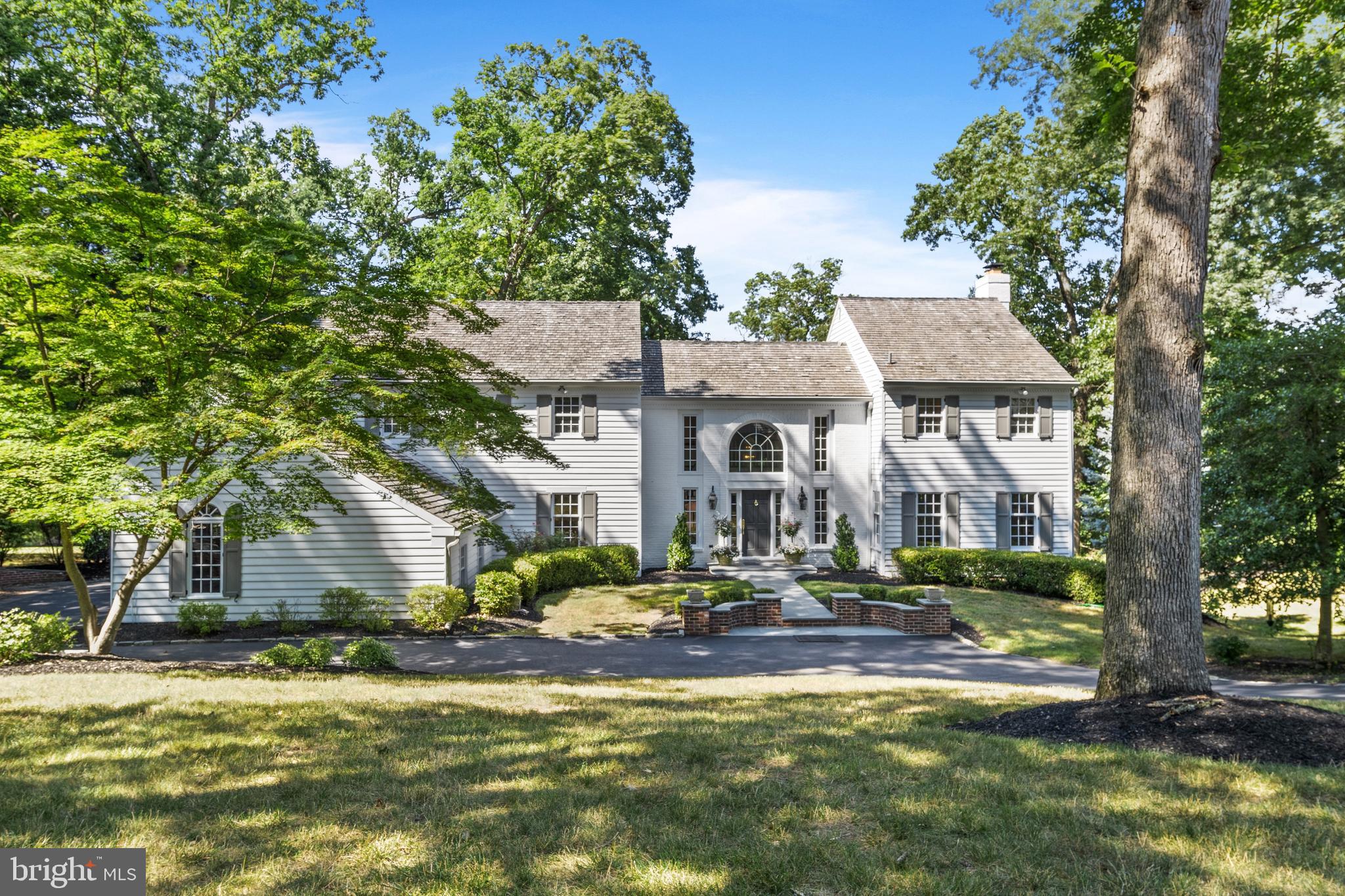 PRICE IMPROVEMENT! Here is your opportunity to own a masterpiece in one of Media's most sought after neighborhoods. Lushly landscaped grounds designed by a landscape architect. Enjoy a very rare, unobstructed view of the reservoir. This home was constructed with the highest quality materials. A brand new Belgian brick semicircular driveway was installed in 2020. Marvin windows throughout with true divided light grills. The house is constructed of cedar siding, newly painted with a 5/8" cedar shake roof 20 years young. Old world charm blends seamlessly with a spacious modern floor plan. This 7 bedroom 5 and 1/2 bath estate gem has brand new gorgeous wide white oak plank floors throughout the first floor with brand new Karastan carpeting upstairs. Upon entering the spacious entrance hall you have front to back windows with outstanding views of the reservoir. An elegant formal living room with large windows and and a wood burning fireplace. A formal office/study is situated through french doors right off the formal living room. Step down into your great room with floor to ceiling windows to admire the views of the backyard. A wood burning fireplace with large wooden mantels complete this room with plenty of natural sunlight. A professional style gourmet kitchen with Wolf cooktop and subzero refrigerator features off white glazed cabinetry, a sumptuous 10 foot center island, granite countertops and a tiled backsplash. The kitchen includes a large breakfast area with french doors leading to the deck which overlooks the grounds. A formal dining room features crown molding and wainscoting is conveniently located off the kitchen for entertaining and formal dinner parties. The first floor has a brand new completely renovated powder room as well as a mudroom and laundry leading to the 3 car garage. Upstairs the palatial primary suite is bathed in sunlight from picturesque extra large Marvin windows with a wood burning fireplace. A spa like ambiance awaits with an extensive dressing area with 2 master walk in closets. The master bathroom has been completely renovated with a magnificent freestanding bathtub and Calcutta marble shower with a beautiful brand new vanity . Three additional bedrooms and a brand new completely renovated full bath and an additional full bathroom complete the second floor. The third floor boasts of 2 additional bedrooms with a large closet and shared full bath. The lower level has walk out sliders to the patio which flank a wood burning fireplace. A wet bar/entertaining area is carpeted and includes an additional bedroom and full bath for an au pair or in law suite. Plenty of storage is also included in the lower level space. Plenty of room for workout equipment. This exceptional home is not to be missed. Award winning Rose Tree Media Schools, close to the blue route, airport, Center City and public transportation. Minutes from downtown Media, this paradise could be yours.