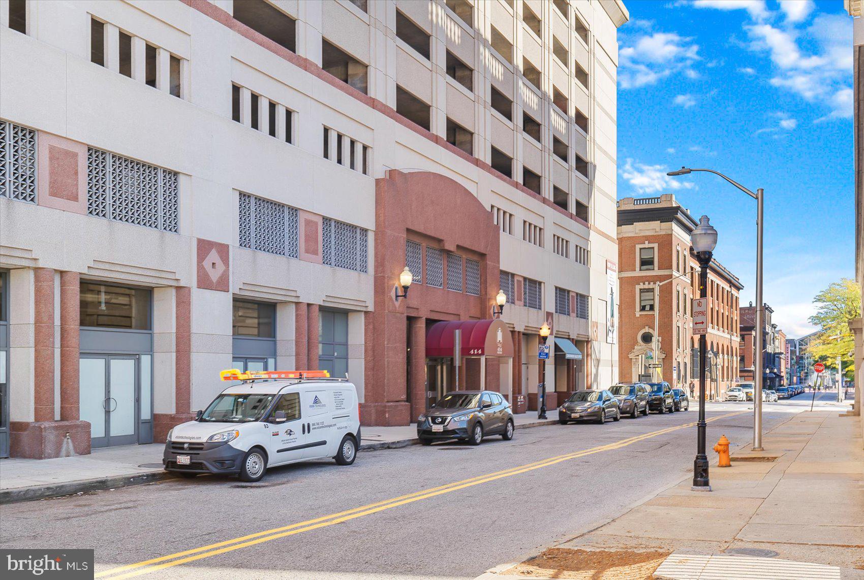 GORGEOUS 2 Bedroom 2 FULL Bath Condo located in the Water Street Condo's in downtown Baltimore * Breath-taking PANORAMIC VIEWS of the Inner Harbor * Complete open concept SUNFILLED unit with a BEAUTIFUL kitchen that has granite countertops and stainless steel appliances * GLEAMING hardwood floors * GAS fireplace * New heat pump * Large PRIMARY suite with a walk in closet * Second bedroom and another FULL bath * 24 HOUR concierge and security * Parking included * The condo fee is actually is $984 and the parking is $181 to make the total fees $1165 * Pool and gym * Meeting rooms * Walking distance to the ballparks, shops and restaurants!!