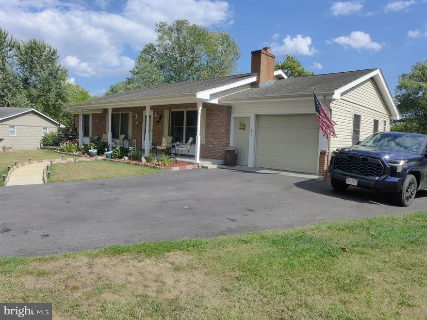 Cont on sale of home with a kick out!  Are you ready for your dream home?   Huge Fenced yard for kids and critters?  In the last 3 years, new bathrooms, new hvac, new roof, $14000 driveway, new appliances, soffit and gutters making a maintenance free exterior.  Freshly painted inside upstairs and down. Do you want a huge laundry/pantry off the kitchen?  See the picture it is great! 
 Child friendly close to everything and on a safe cul-de-sac with very little traffic.    Nice front porch and great family room on main level overlooking the entire yard.
The basement has bed, bath, huge storage room and living room with kitchen.  Perfect man cave or inlaw suite with outside entrance too!
You will love this home!  Seller added  310 sq ft with laundry and family room addition on main floor!