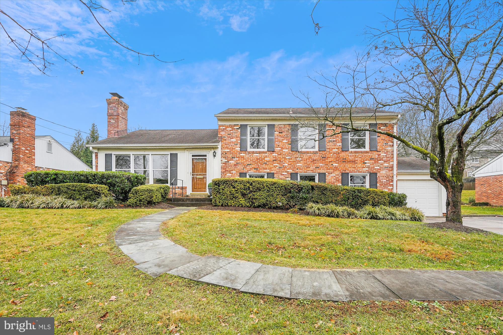 Welcome to this lovingly cared for home located in the top-rated Whitman school district. Cherished by the same family for almost 50 years, this well-maintained residence is situated in one of Bethesda’s most desirable neighborhoods.
This spacious home offers four levels of living space, featuring 4 bedrooms and 2.5 baths. The highlight is the beautiful Great Room addition, boasting a cathedral ceiling, an abundance of windows, and built-in cabinetry and shelving, creating a bright and inviting atmosphere.
The main level includes an attractive living room with a wood-burning fireplace, a dining room, and a kitchen that opens to the Great Room, perfect for family gatherings and entertaining. The lower levels offer a family room and a versatile recreation room or office, providing ample space for work and play. The upper level features four bedrooms, including a primary bedroom with an ensuite bathroom for added convenience.
The home showcases hardwood flooring throughout, providing a warm and elegant touch. With plenty of light-filled living spaces, the possibilities to personalize and make this home your own are endless. There is also abundant storage in the walk-up attic, laundry and utility rooms. Outdoor space includes a patio with a brick retaining wall and a nice-sized, fenced backyard, perfect for relaxing or entertaining. There is also a one-car garage.
Situated on a lovely street, this home is in a prime Bethesda location. Enjoy the two-block walk to Whitman and Whittier Woods Park! It is conveniently close to downtown Bethesda, several Metro stations, bus lines, and major commuter routes, ensuring smooth travel to DC and Virginia. Additionally, the home offers easy access to the Capital Crescent Trail, shopping, restaurants, local attractions, parks, and recreational facilities.
Don't miss the opportunity to own this delightful home in one of Bethesda's most sought-after neighborhoods!