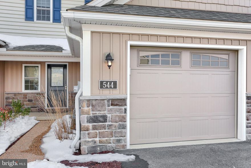 This immaculate 3 bedroom home in desirable Wood's Edge community boasts a premier location with stunning views of farmland behind!  Open layout in the main level with upgraded flooring throughout and a large kitchen with island for entertaining.  Convenient 1st floor master bedroom with full bathroom and walk-in closet.  Plenty of additional room to expand in the full daylight walkout basement.  All appliances stay and also upgraded blinds, keyless entry system, smart garage door, and workshop in garage!  This home is easy to show and in a great location so act fast to schedule your showing before it's gone!