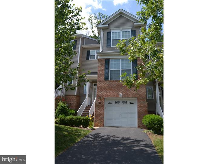 Lovely furnished 3 BR with loft Montgomery Hills townhome, backing to woods and open space, and minutes to town, campus, shopping, the train and commuting roads. Wood floors, vaulted ceilings, double sided fireplace, California Closets, and large rear deck all make for and pleasant and upscale living experience. Well regarded Montgomery schools, too!