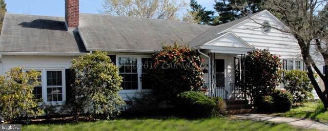 Great location close to college. Restaurants & services. Hardwood floors throughout, new heating system, family room has new paint & flooring, nice backyard space and landscaping.
