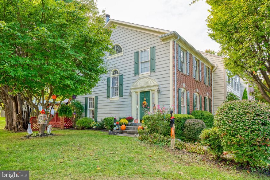 Rarely available 24 ft wide, end of group townhome w/side entry. Spacious kitchen w/breakfast bar and eating area, bright and open living room/dining room w/skylights...opens to inviting backyard deck. All  bedrooms w/vaulted ceilings...family room w/wood burning fireplace & half bath...Great value!