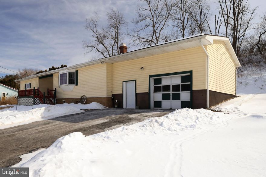 OPEN HOUSE: Sun, Feb 15 11:00 AM - 1:00 PM | This single-family/manufactured home is situated in a quiet rural setting and offers a practical layout with room to grow. Fully remodeled in 2017, the interior features a large living room space with a cozy fireplace and bay window. An open kitchen layout connects the ground level back door and patio to the main living area, supporting comfortable daily living with optimal functionality. The house has 3 bedrooms and 1 full bathroom, with convenient potential to add an additional half bath in one of the bedrooms. The unfinished basement provides ample storage and future finishing potential with washer/dryer hookups. A large garage offers substantial space for vehicles, equipment, and a workshop. Outside, the front porch overlooks a large yard with plenty of room for gardening activities while maintaining simple upkeep. This property presents a solid opportunity for buyers seeking space while not being too close or too far from town. No equipment? No problem, the sale includes a pressure washer, snow blower and lawn mower.