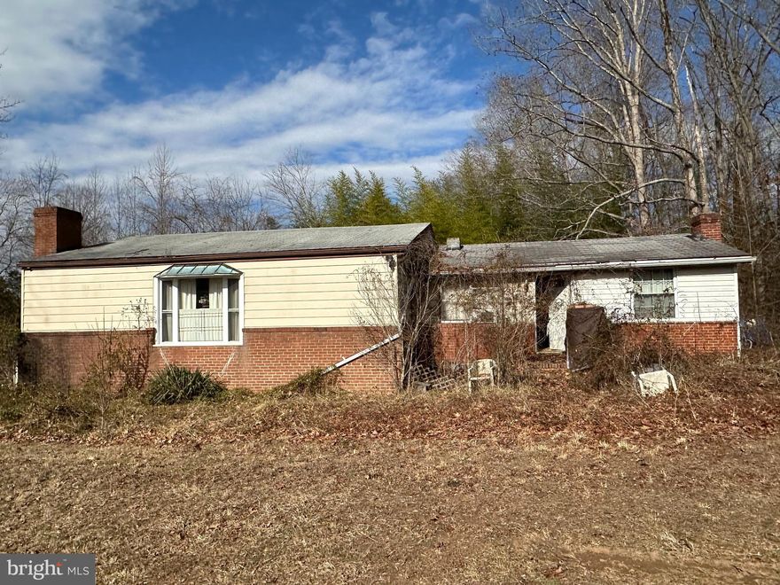 SOLD AS IS. This 3 bed 1 bath home is an untapped gem awaiting your personal touch.  The wood-burning fireplace adds warmth and charm to the living room, a cozy focal point for family or friends to gather. The nice-sized kitchen offers great counter space. The 3 bedrooms await your decorative touch. Peaceful property on .49 acres with mature trees, ideal for relaxation or entertaining. Prime location..located only minutes from downtown Gordonsville. This home invites the right buyer to envision the possibilities and create something truly one-of-a kind. Don't miss this opportunity to transform this property into your ideal haven.