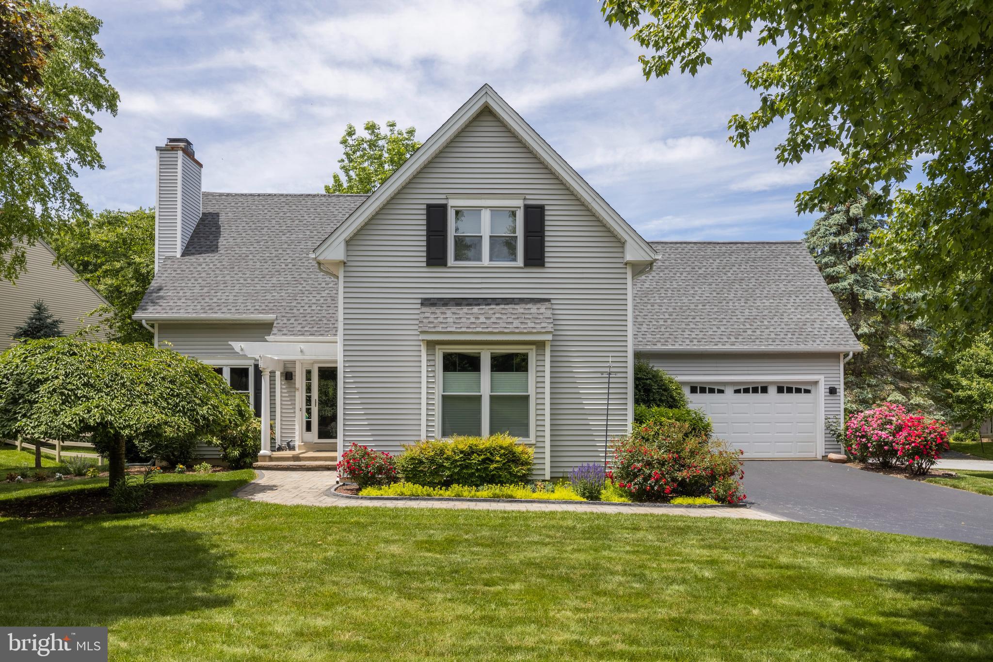 Absolutely beautiful 4 bedroom, 2.5 bathroom colonial with first-floor primary bedroom suite in coveted Eagleview development. This fantastic home with a 2-car garage has been meticulously cared-for and continuously upgraded: featuring wonderful hardwood floors on the main level, living room/great room with cathedral ceiling and fireplace, formal dining room, spacious kitchen (remodeled and new appliances, 2013), with plenty of cabinets and breakfast area which opens to a fabulous rear covered-porch (which could easily be enclosed). The first floor primary suite is gorgeous with Spanish tile flooring (2021), bathroom remodeled (2017), and a large walk-in closet (remodeled 2013). New Cherry wood stairs installed in 2021. The second floor has new hardwood flooring (2020), boasts three additional generous sized bedrooms (new wall-to-wall carpeting, 2020), and full bath. Enjoy lounging in a wonderful finished lower-level family room which is plumbed for an additional bathroom and has a separate room for a home office or flex space. Additional upgrades include: New Roof (November 2020), Leaf Gutter Protection (2021), whole house water filtration system (2018), exterior house painted (2016), new windows installed (2016), HVAC and water heater replaced, and garage attic insulation installed (2013), new upgraded front porch storm door (2021), new walkway from driveway to front porch (2019), blackout blinds (2019), new garage door and opener installation (2016), custom bookcase and lighting installation (2013). This home is extremely well-located within Eagleview and also the Downingtown community. You can easily access Restaurant Row, shopping, the ACAC fitness center, a tot lot playground, walking paths and community pools! Great access to transportation, including entry to the PA Turnpike and routes 100 and 113, just outside the community. This home is situated in award-winning Downingtown Area School District home to STEM Academy, one of the top public high schools in the state.