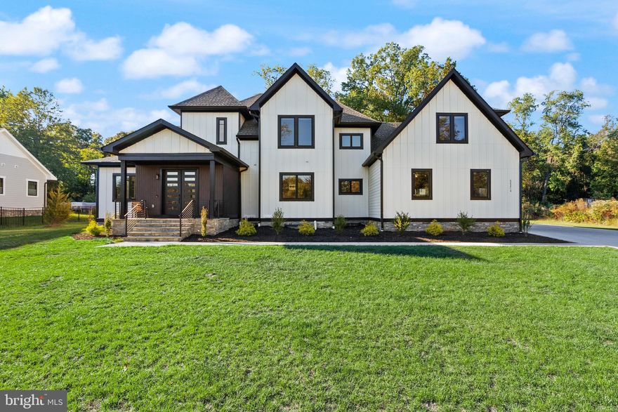 The Best Home of 2025 Hits the Market -Where Dream Meets Reality. Step inside and fall in love with this custom-built Arts & Crafts–style luxury home, designed to impress at every turn. Almost 8,900 total sqft! From the moment you walk up to the stone front porch, you’ll feel the quality and craftsmanship that make this home truly one of a kind. Light pours through beautiful casement-style windows, highlighting the open two-story foyer, white oak wood floors, gracious hallways, and soaring ceilings that create a sense of airiness and space. Top-of-the-line materials and premium finishes enhance every corner of this home. The main level offers two versatile bedrooms or offices, a powder room, and a warm family room that flows effortlessly into the spacious living and dining areas. The gourmet kitchen is a showstopper, perfect for hosting dinner parties or weekend brunches. Across all levels, you’ll find well-appointed bedrooms, most with a walk-in closet and en suite bathroom featuring smart-bidet toilets, offering comfort and privacy for everyone. The primary suite feels like a five-star spa, complete with a stunning bath that includes an oversized bathtub in the shower room and a ceiling heater for the ultimate luxury experience. The laundry room is so large and well-designed, it could double as a bedroom! (Can move washer/dryer from upper level to the basement or upper level family room). Down the hall, a wet bar and another family room provide another ideal hangout spot. The finished basement offers even more living space with a recreation area, an entertainment or gym room, a kitchenette, storage room and two additional bedrooms plus two walk-up accesses to the yard. 2nd laundry room located in basement as well. The home has a 30-year architectural shingle roof, Hardie Plank siding, and board-and-batten accents on the front. You have a rare 1.73-acre lot featuring two stone patios, one with a covered outdoor kitchenette for year-round entertaining. The three-car garage and expansive driveway has an electric car charger for extra convenience. Tucked away on a quiet no-thru street yet just minutes from Routes 29, 28, and 66, shopping, dining, and top-rated Powell Elementary School, this location perfectly balances privacy with convenience. Every inch of this home was built to inspire and to impress. No HOA. Don't forget to check out video, drone media, floor plan etc! (not pictured are upstairs laundry room and main level office)